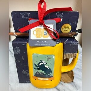 Rae Dunn Yellow Color-Changing Mug with Red Ribbon and Brown Stir Stick